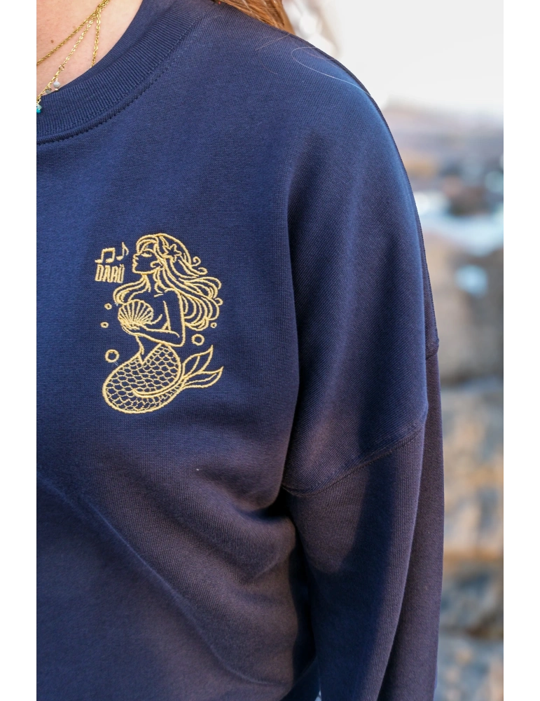 Détail broderie sirène fil cuivré