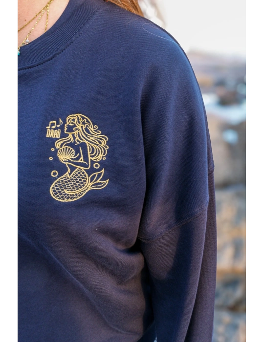 Détail broderie sirène fil cuivré