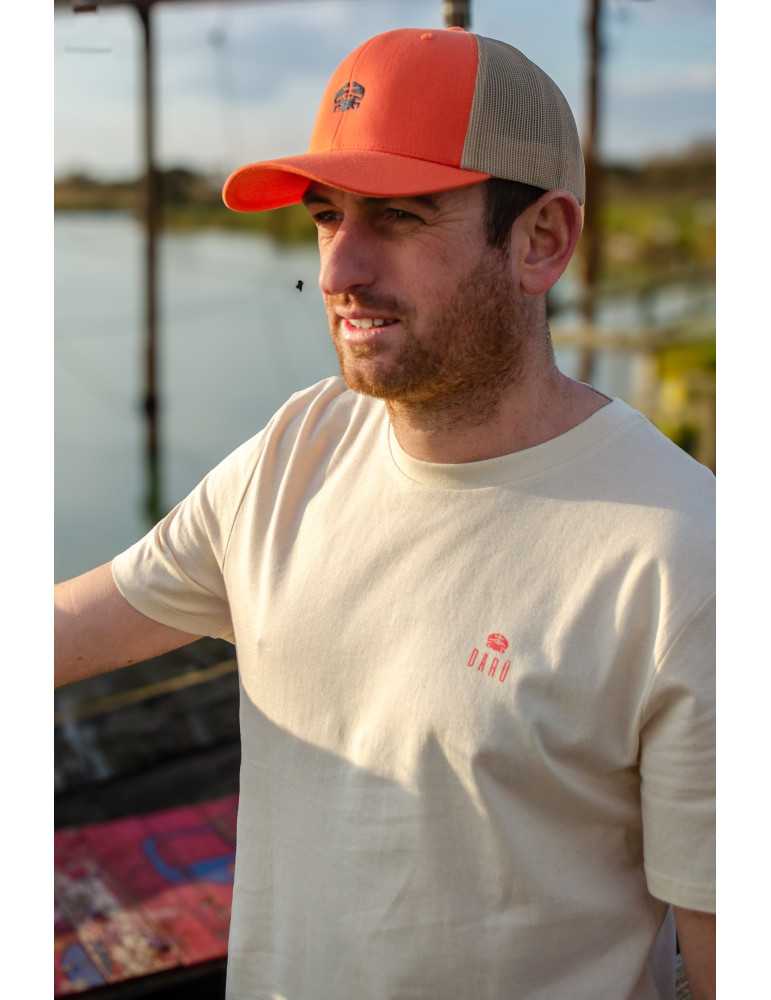 Petit logo devant la gauchère pose