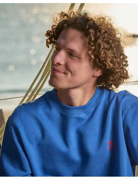 Détail logo crabe DARÜ brodé – sweat coton bio